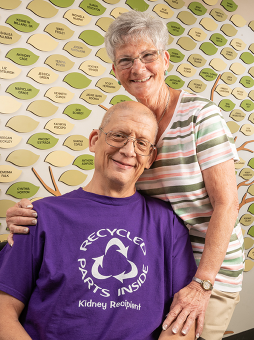 Preston, pictured with his wife, Carol, enjoys wearing his “recycled parts” T-shirt to encourage kidney donation. (photo by Robert Mescavage)