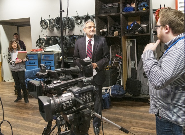 Mantosh Dewan, MD, interim president of Upstate Medical University, prepares for one of his videotaped updates about COVID-19 issues to Upstate’s more than 9,000 employees. (photo by William Mueller)