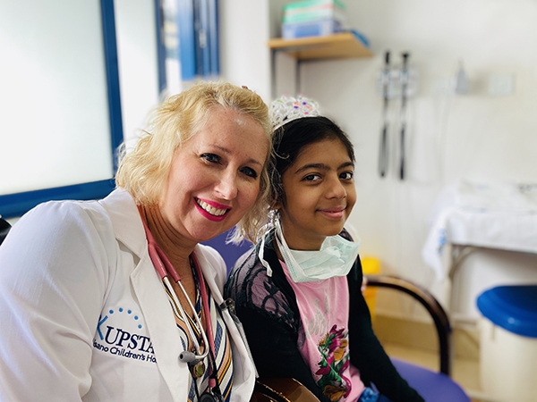 Brooke Fraser with a cancer patient in Kenya. (provided photo)