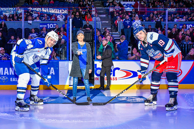 To raise awareness of lung cancer, Coombs was asked to drop the puck at a Syracuse Crunch hockey game last fall. (photo courtesy of the Syracuse Crunch)