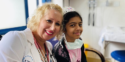 Global outreach: She volunteers to improve pediatric cancer care