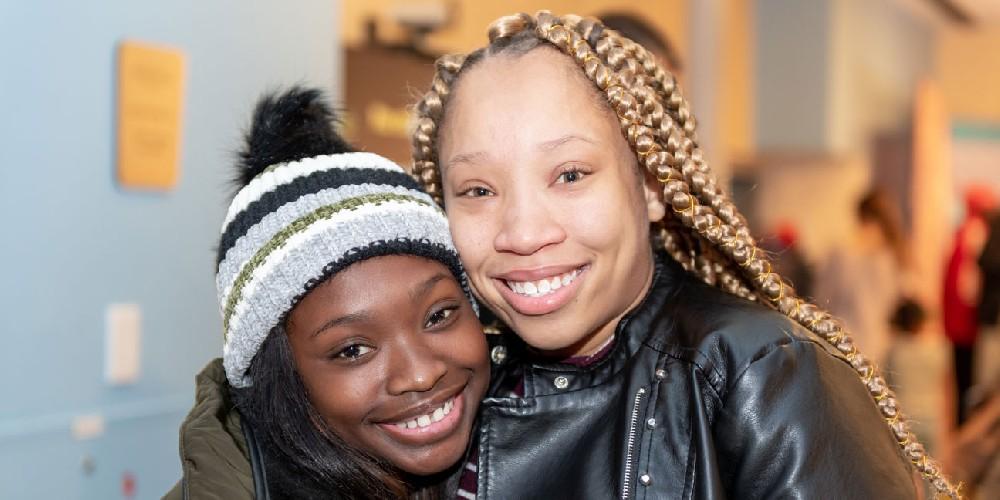 Syracuse teens Knai Bridges, left, and Malyzha Espey have sickle cell disease; they met an an event at Upstate for young people with sickle cell and their families. (photos by Robert Mescavage)