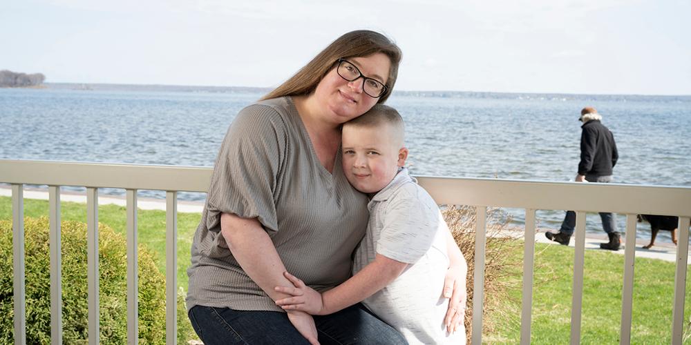 Nina Alfano and her son, Gregory, at William’s Beach in Cicero. She had surgery to treat cervical cancer discovered during the coronavirus pandemic. (photo by Susan Kahn)