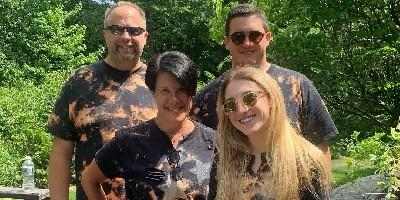 Clockwise from front left: Sklow; her partner, Robbie Birnbaum; and her children, Kenan and Charlotte.