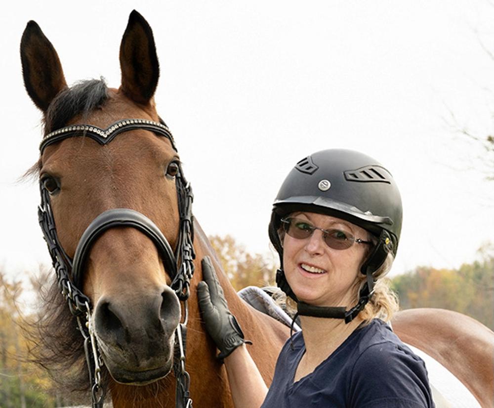 White with Magdelena, the half-Arabian champion she raised and trained.