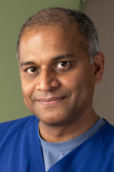 Neurosurgeon Harish Babu, MD, PhD, is co-director of Upstate’s brain tumor program and director of minimally invasive neurosurgery. (photo by Susan Kahn)