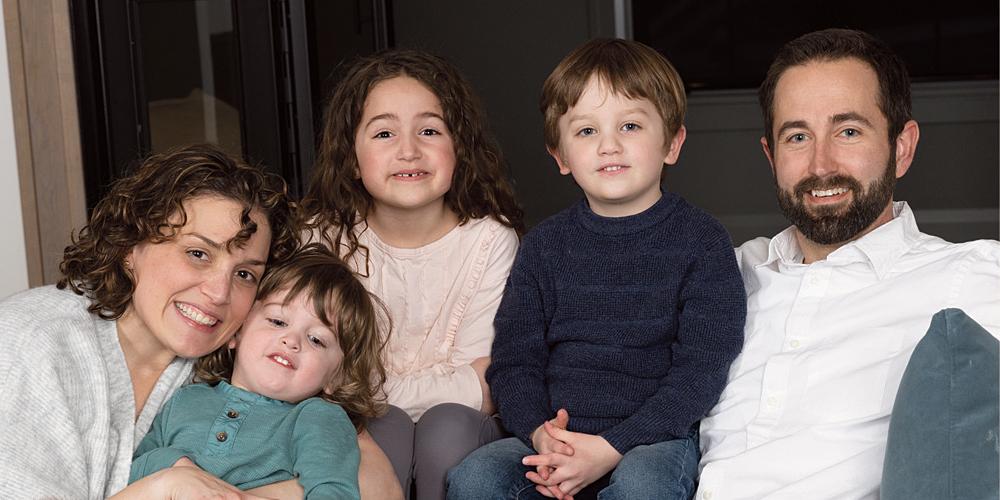 Nurse practitioner Davia Moss with her husband, Patrick Adcock, MD, and their children, from left,  Asher, Eliana and Cason. (photo by Susan Kahn)