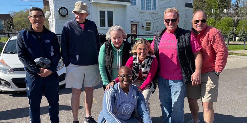 Event organizer Nneka Onwumere, center, and fellow walkers, from left, Lawrence Chin, MD, and family members of Debbie Gregg: Gordon and Stephanie Shutzendorf, Jennifer Hooley, Dennis Gregg and Chip Hooley.