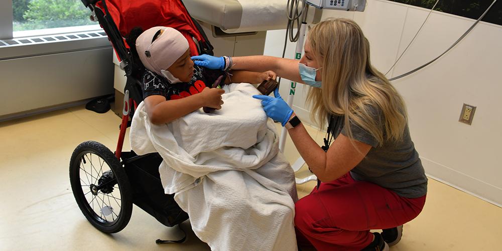  One of Juju’s caregivers is pediatric nurse Lauren Wilbur.