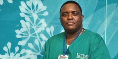 Myron Martin cleaned rooms of COVID patients thousands of times during the pandemic.