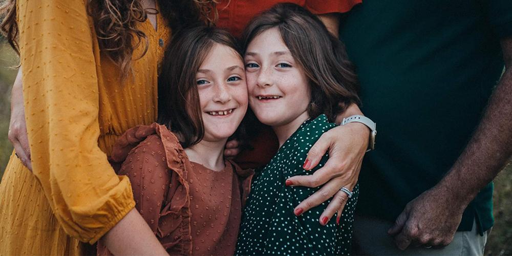 Cassidy Meany, left, and sister Stella Meany appear in a photo provided by their mother, Cheryl Meany.
