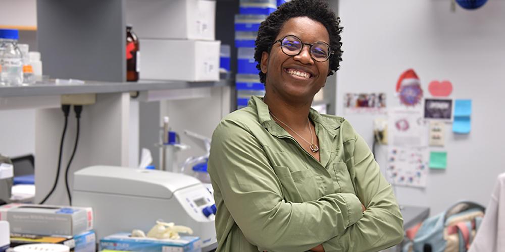 Deanna Clemmer works in the Upstate lab of Harry E. Taylor, PhD, a virologist and immunologist. Photo by Deborah Rexine