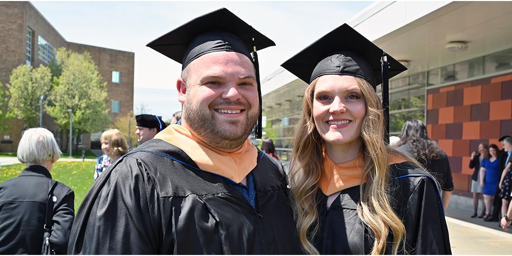 Mackenzie "Mack" Stanley and his wife, Paige Stanley, graduated together from Upstate as nurse practitioners in May 2023. Photo by William Mueller