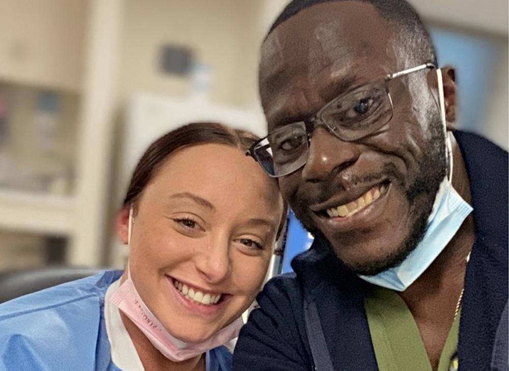 Cadet with fellow nurse Christina Accorso when he returned to light duty after the accident. Accorso had previously worked with Cadet in the medical ICUs and the burn unit. Photo courtesy of David Cadet